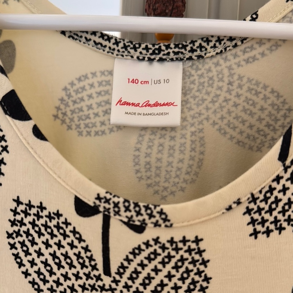 Chic Cream Dress with Black Floral Design